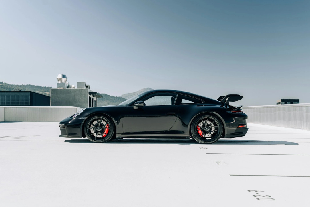Porsche car in the parking lot on the roof